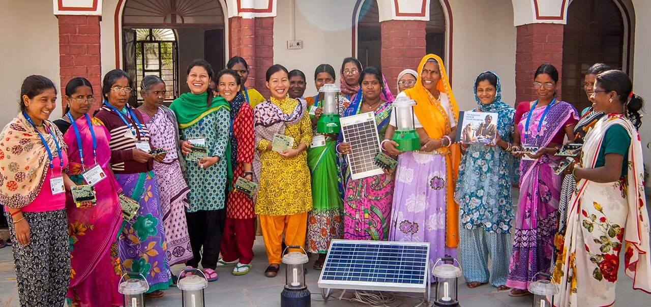 Diverse group of women posing for a photo