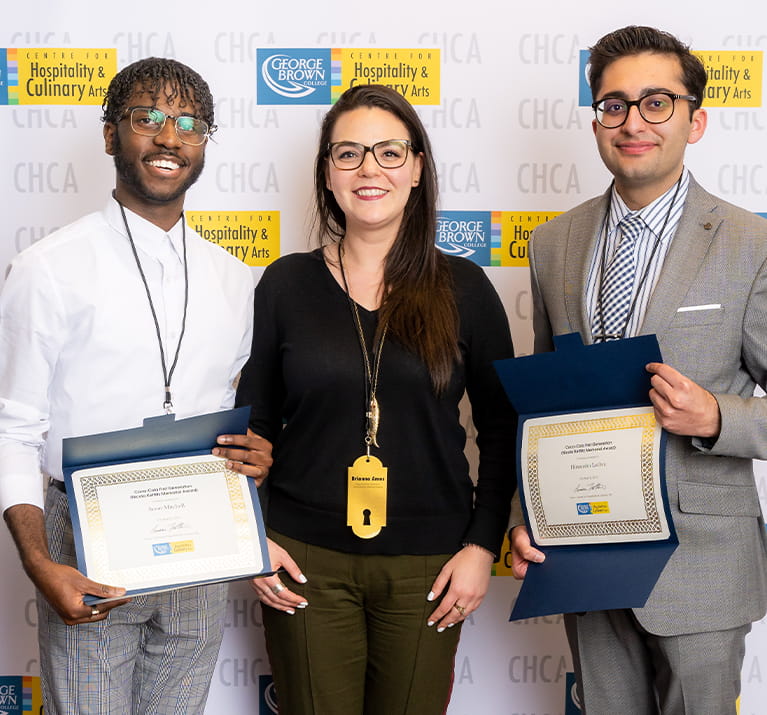 Left - right: 2019 Award recipients Jason Mitchell and Himanshu Luthra. Coca-Cola’ Canada's Brianna Ames (Centre)