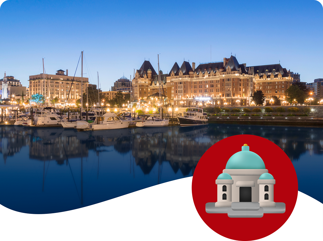 The illuminated Inner Harbour of Victoria, B.C. at twilight, a featured grand prize trip for the Coca-Cola summer contest.