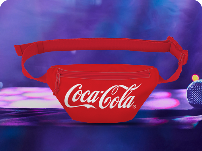 A vibrant red Coca-Cola canvas hip pack with a white script logo, a prize available in the Festive Moments contest.