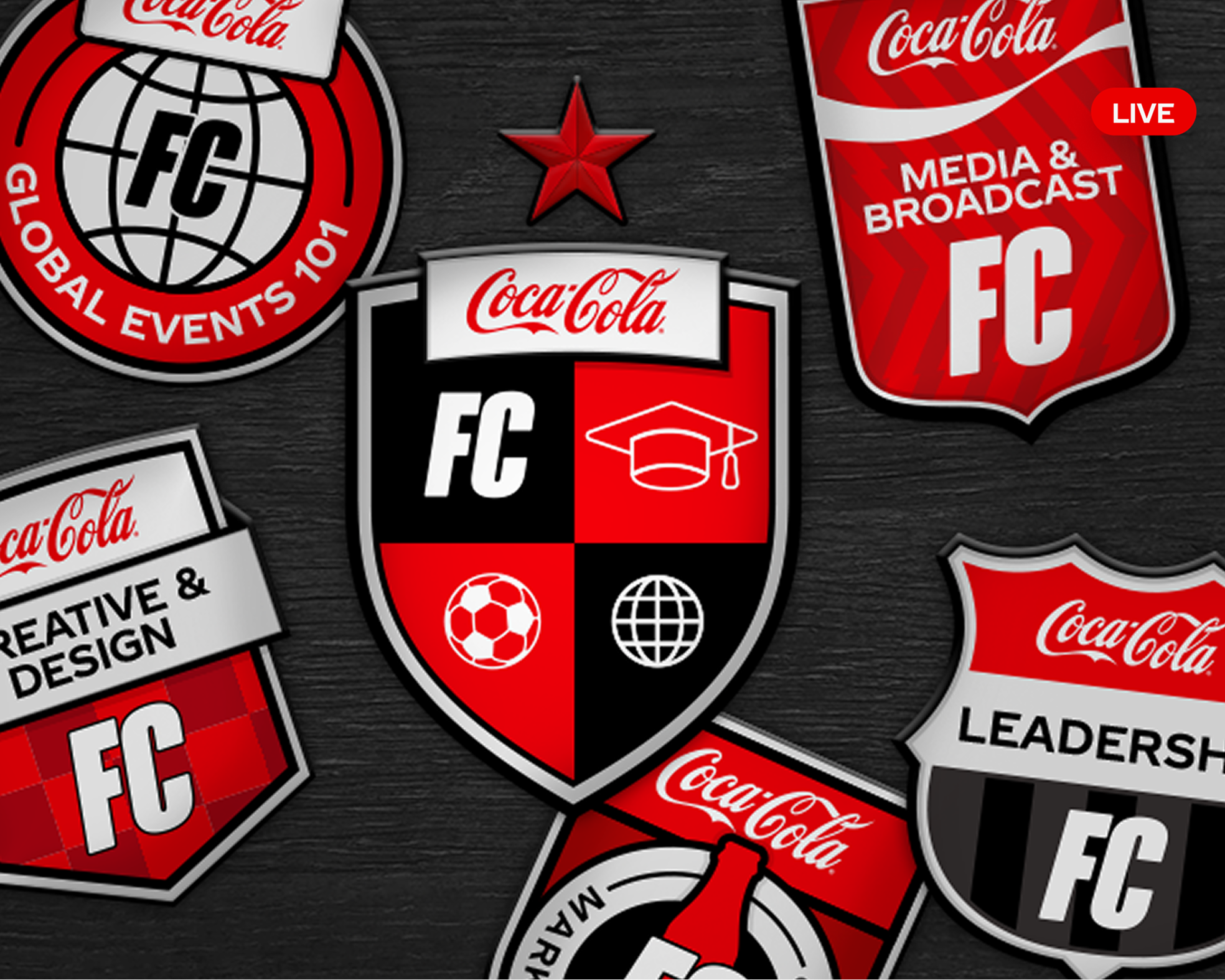 A desktop banner displaying multiple Coca-Cola FC Academy soccer badges, highlighting a central graduation cap crest.