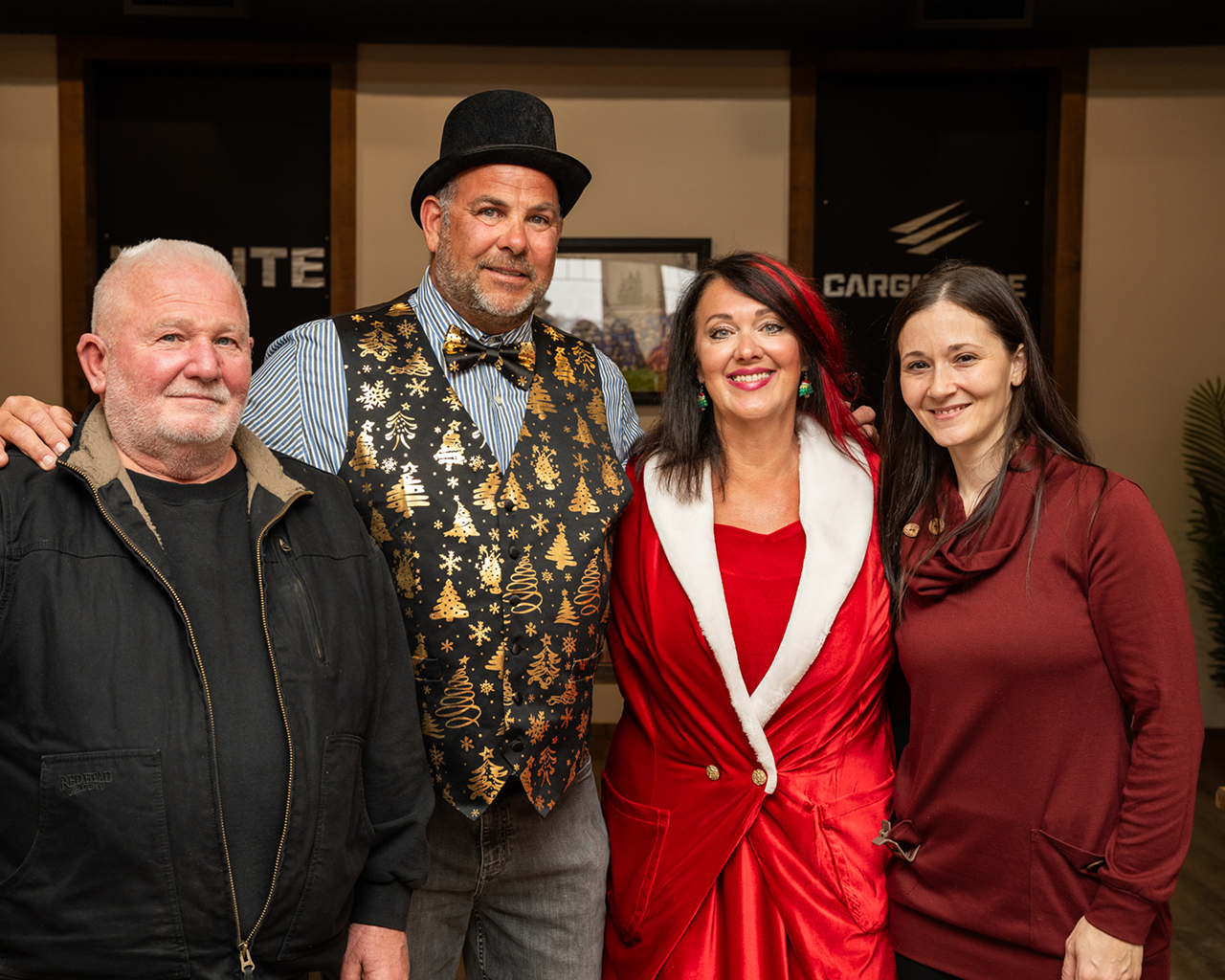 group of people standing together smiling