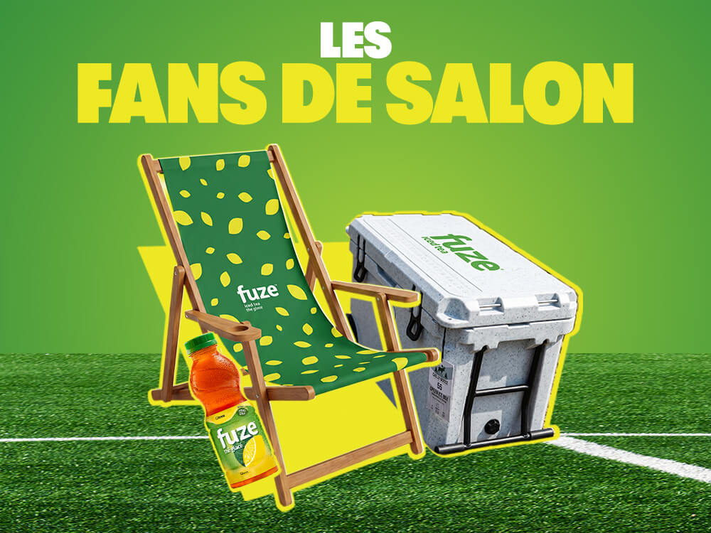 FUZE thé glacé Armchair Fan avec chaise longue verte, glacière et bouteille sur terrain de soccer sous grand titre jaune.
