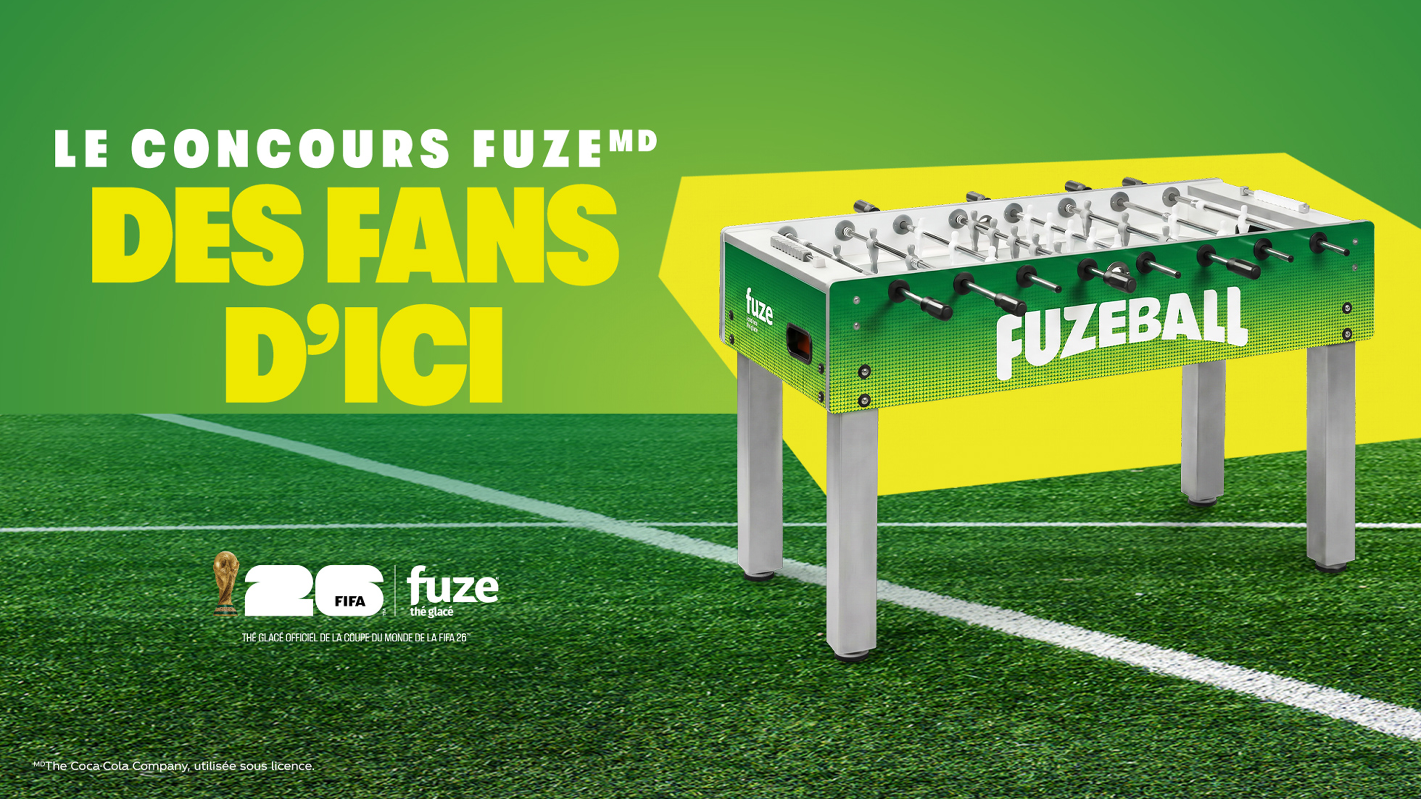 Bannière du Concours FUZE des fans d’ici avec table de baby-foot verte FUZEball sur terrain de soccer