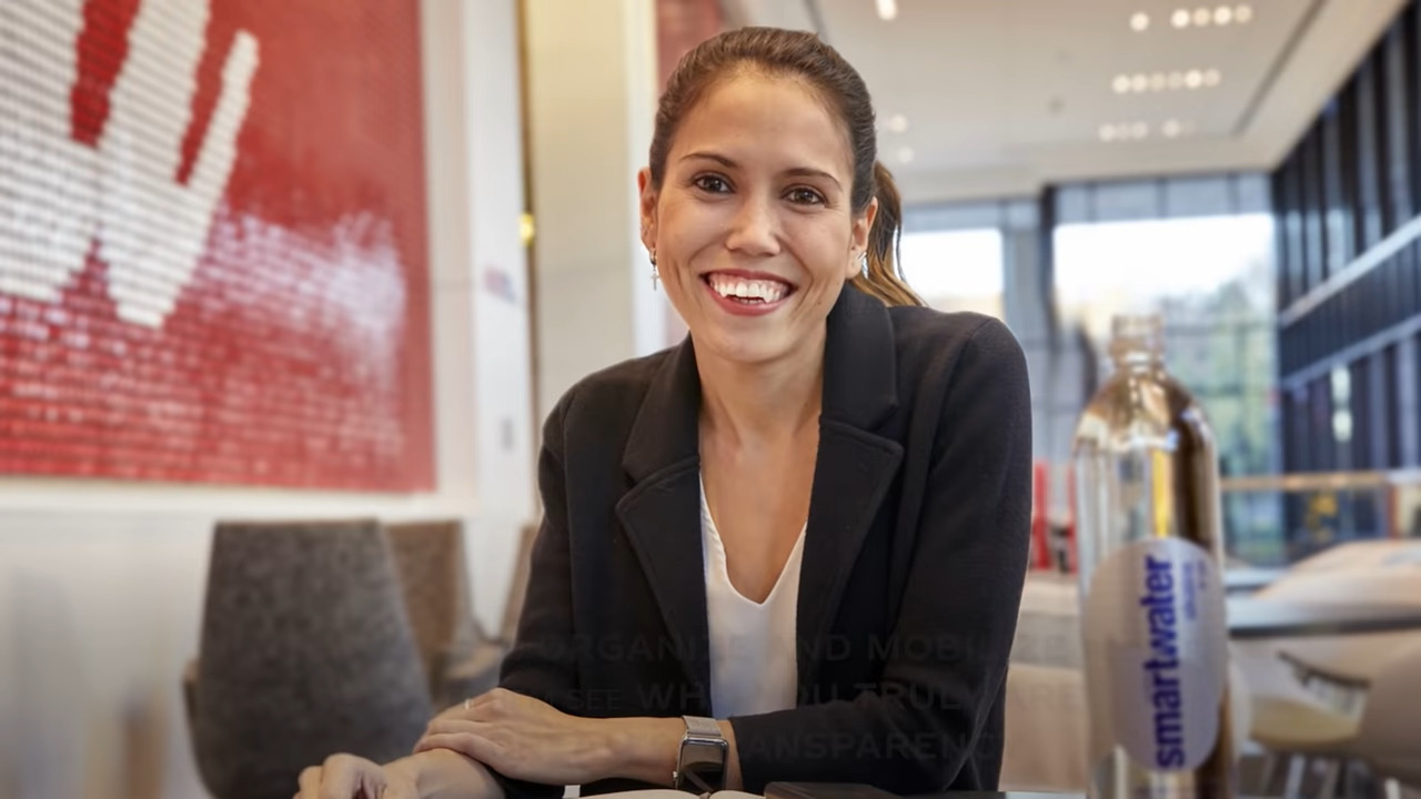 Image of a woman working at Coca-Cola