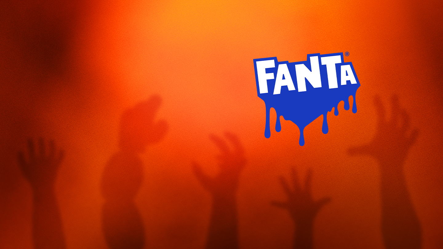 Uhyggelige hænder rækker ud efter Fanta-logoet på orange baggrund