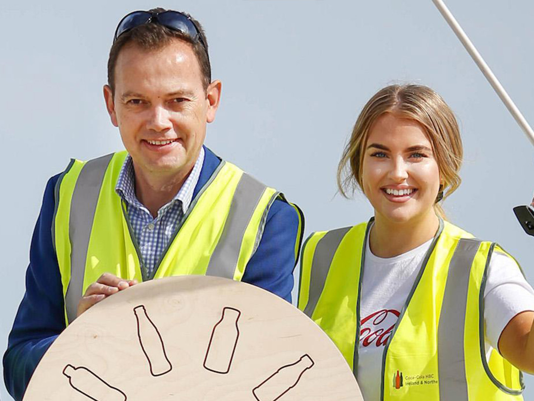 Group of people wearing safety vest smilling