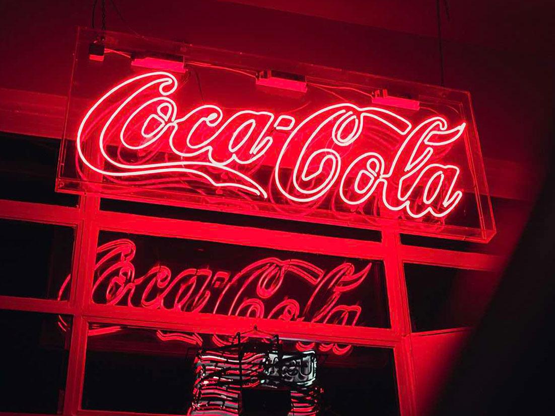 Coca-Cola logo made in red neon light