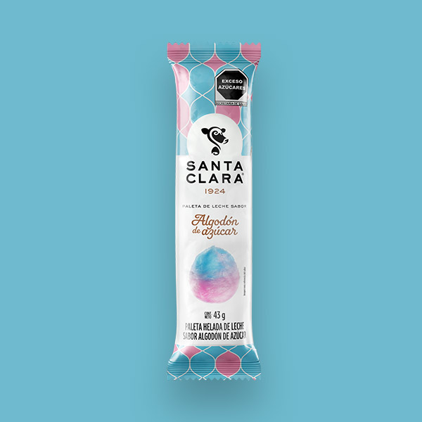 Paleta de leche sabor Algodón de Azúcar Santa Clara en su empaque de colores turquesa y rosa con una imagen de algodón de azúcar