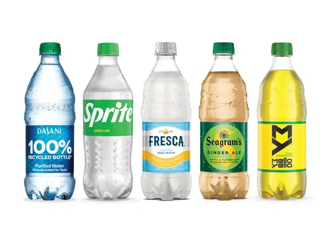 Coca-Cola's variety of products aligned on a white background