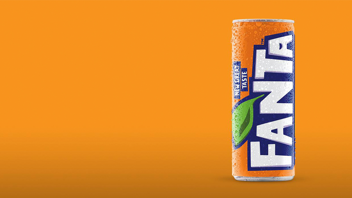 Fanta Orange can on orange background