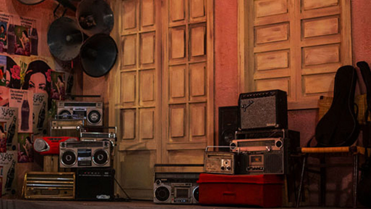 A group of vintage radio equipment in a room