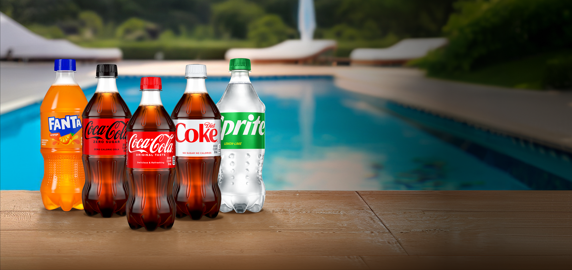 Bottles of Fanta, Coca-Cola, Diet Coke, and Sprite sit on a wooden deck by a swimming pool for a mobile banner.