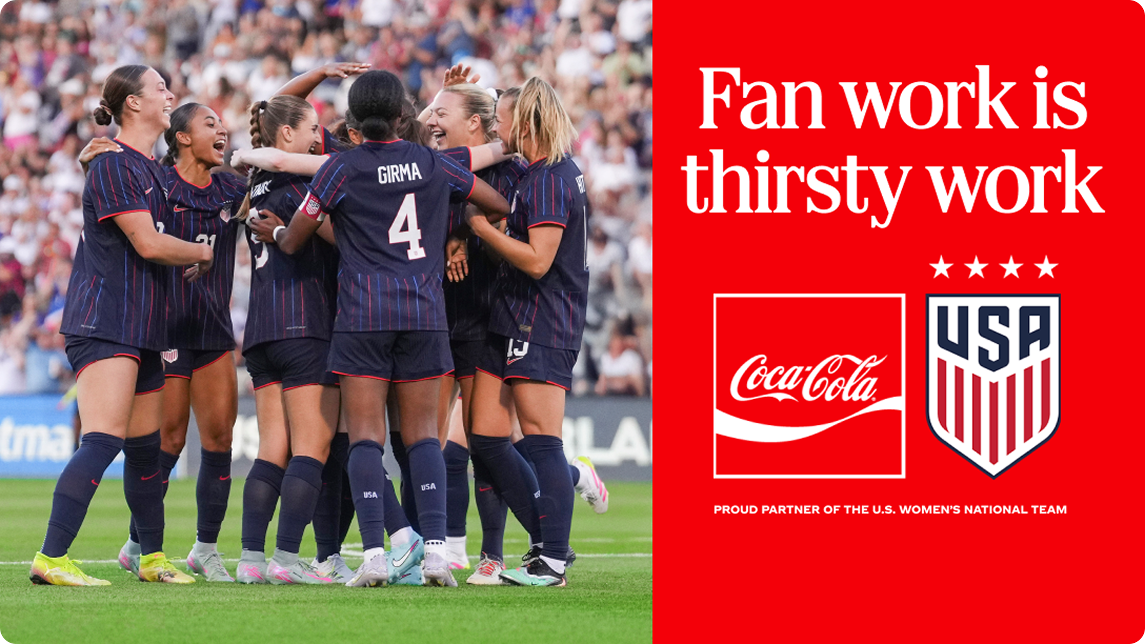 U.S. women’s soccer players huddle on field beside red Coca-Cola banner reading Fan work is thirsty work.